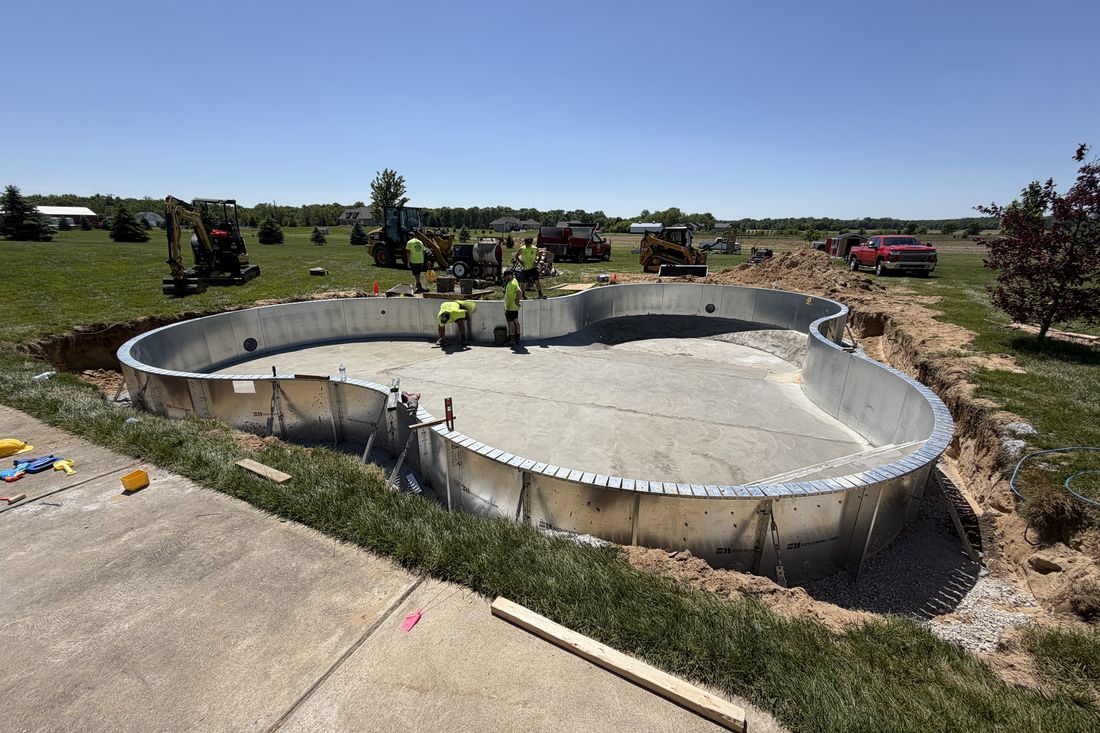 In-ground pool structure and concrete work in progress