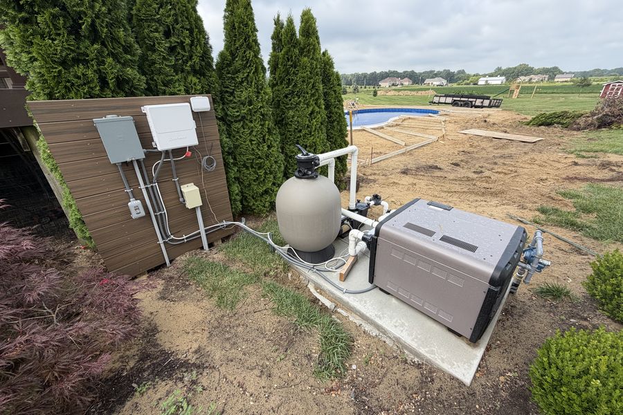 Pool equipment pad with automated salt system